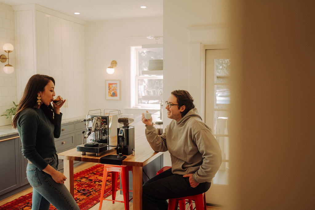 two friends enjoying a coffee together lifestyle by clive coffee