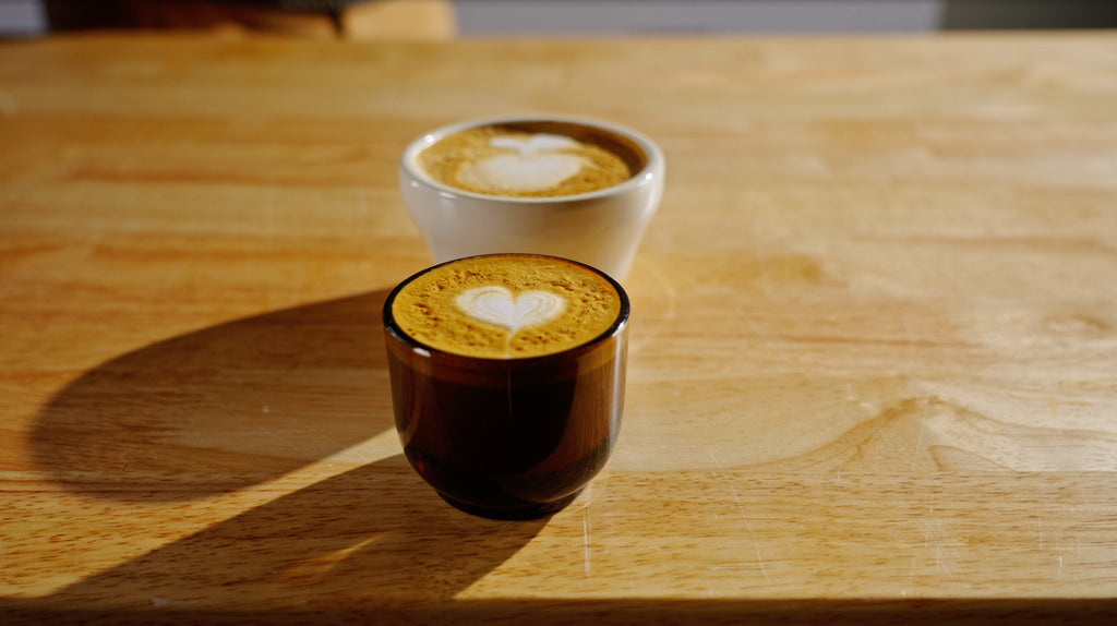 two small milk drinks side-by-side knockout by clive coffee