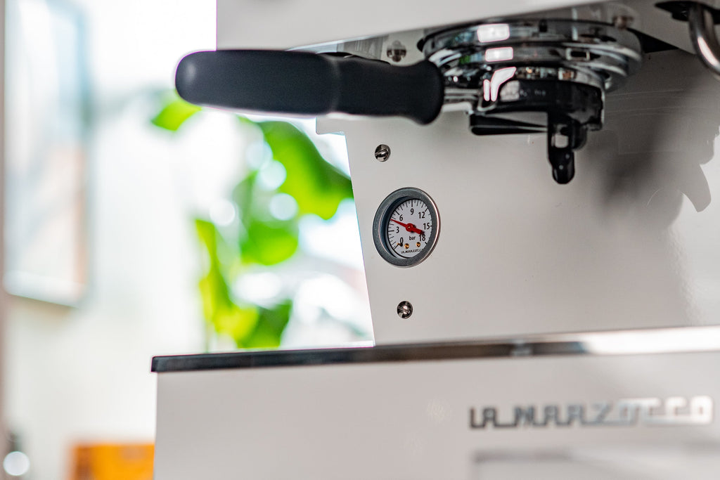 Close up view of the Linea Mini R's backsplash lifestyle by Clive Coffee