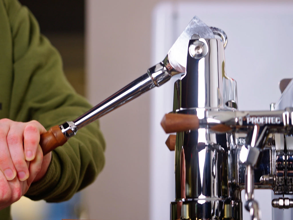 barista using a lever machine lifestyle by clive coffee